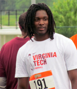 Sweat, pictured here looking on at a Virginia Tech camp in June of 2013, made an official visit to VT over the weekend.