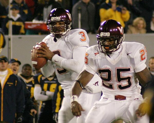KJ provides protection for Bryan Randall during the 2003 VT-WVU game.