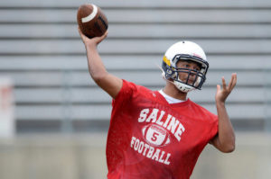 Jackson, throwing a pass in the preseason of his junior year (Photo from Saline Football)