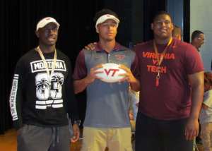 From left, VT recruits Reggie Floyd, Eric Kumah and Tim Settle following Kumah's press conference 